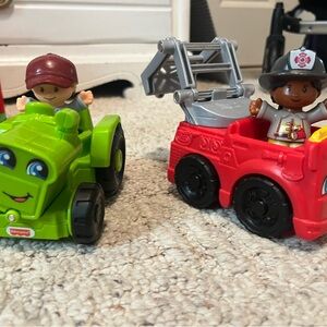 Fisher-Price Little People Green Tractor and Red Fire Truck